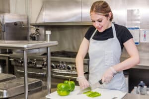 Kitchen staff prepping meal for residents