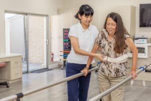 Therapist helping a resident with rehabilitation