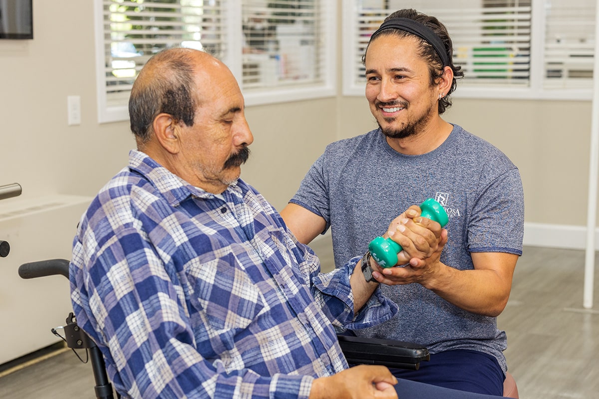 Therapist helping a resident with rehabilitation